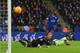 LEICESTER, ENGLAND - DECEMBER 29: Raheem Sterling of Manchester City (R) looks on as his shot is saved by goalkeeper Kasper Schmeichel of Leicester City during the Barclays Premier League match between Leicester City and Manchester City at The King Power Stadium on December 29, 2015 in Leicester, England. (Photo by Michael Regan/Getty Images)
