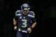 Seattle Seahawks quarterback Russell Wilson runs onto the field before an NFL football game against the St. Louis Rams, Sunday, Dec. 27, 2015, in Seattle. (AP Photo/John Froschauer)