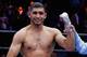 NEW YORK, NY - MAY 29: Amir Khan raises his arms in victory after a unanimous decision win against Chris Algieri after their Welterweight bout at Barclays Center of Brooklyn on May 29, 2015 in New York City. (Photo by Al Bello/Getty Images)