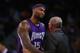 OAKLAND, CA - DECEMBER 28: DeMarcus Cousins #15 of the Sacramento Kings is consoled by George Karl of the Sacramento Kings after being taken out of the game after he picked up his third foul against the Golden State Warriors at ORACLE Arena on December 28, 2015 in Oakland, California. NOTE TO USER: User expressly acknowledges and agrees that, by downloading and or using this photograph, User is consenting to the terms and conditions of the Getty Images License Agreement. (Photo by Ezra Shaw/Getty Images)