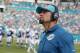 Miami Dolphins interim head coach Dan Campbell looks up during the second half of an NFL football game against the Indianapolis Colts, Sunday, Dec. 27, 2015, in Miami Gardens, Fla. (AP Photo/Joe Skipper)