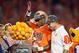 MIAMI GARDENS, FL - DECEMBER 31: Deshaun Watson #4 of the Clemson Tigers and head coach Dabo Swinney celebrate defeating the Oklahoma Sooners with a score of 37 to 17 to win the 2015 Capital One Orange Bowl at Sun Life Stadium on December 31, 2015 in Miami Gardens, Florida. (Photo by Andy Lyons/Getty Images)