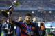 FC Barcelona's Neymar holds a trophy after winning the final match against River Plate at the FIFA Club World Cup soccer tournament in Yokohama, near Tokyo, Sunday, Dec. 20, 2015. (AP Photo/Shuji Kajiyama)