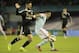 RC Celta’s Augusto Fernández from Argentina, left, fights for the ball against Real Madrid's Isco, during a Spanish La Liga soccer match between RC Celta and Real Madrid, at the Balaídos stadium in Vigo, Spain, Sunday, April 26, 2015. (AP Photo/Lalo R. Villar)