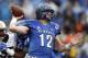 Memphis quarterback Paxton Lynch (12) throws a pass during the first half of the Birmingham Bowl NCAA college football game against Auburn Auburn, Wednesday, Dec. 30, 2015, in Birmingham, Ala. (AP Photo/Butch Dill)