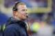 Dallas Cowboys head coach Jason Garrett looks on against the Buffalo Bills during the first half of an NFL football game, Sunday, Dec. 27, 2015, in Orchard Park, N.Y. (AP Photo/Bill Wippert)