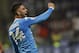 Napoli’s Lorenzo Insigne celebrates after scoring during a Serie A soccer match between AC Milan and Napoli, at the San Siro stadium in Milan, Italy, Sunday, Oct. 4, 2015. (AP Photo/Luca Bruno)