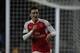 Arsenal's German midfielder Mesut Ozil celebrates after scoring their second goal during the English Premier League football match between Arsenal and Bournemouth at the Emirates Stadium in London on December 28, 2015. AFP PHOTO / ADRIAN DENNIS
RESTRICTED TO EDITORIAL USE. No use with unauthorized audio, video, data, fixture lists, club/league logos or 'live' services. Online in-match use limited to 75 images, no video emulation. No use in betting, games or single club/league/player publications. / AFP / ADRIAN DENNIS (Photo credit should read ADRIAN DENNIS/AFP/Getty Images)