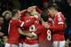 Manchester United's French striker Anthony Martial (C) is congratulated by teammates during the English Premier League football match between Manchester United and Swansea City at Old Trafford in Manchester, north west England, on January 2, 2016. AFP PHOTO / OLI SCARFF
RESTRICTED TO EDITORIAL USE. No use with unauthorized audio, video, data, fixture lists, club/league logos or 'live' services. Online in-match use limited to 75 images, no video emulation. No use in betting, games or single club/league/player publications. / AFP / OLI SCARFF (Photo credit should read OLI SCARFF/AFP/Getty Images)