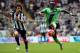 Southampton's Sadio Mane, right, controls the ball with Newcastle United's captain Fabricio Coloccini, left, during their English Premier League soccer match between Newcastle United and Southampton at St James' Park, Newcastle, England, Sunday, Aug. 9, 2015. (AP Photo/Scott Heppell)