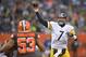 Pittsburgh Steelers quarterback Ben Roethlisberger (7) throws an 8-yard touchdown pass to Markus Wheaton during the second half of an NFL football game against the Cleveland Browns, Sunday, Jan. 3, 2016, in Cleveland. (AP Photo/David Richard)