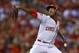 Cincinnati Reds relief pitcher Aroldis Chapman throws during a baseball game against the St. Louis Cardinals, Wednesday, July 29, 2015, in St. Louis. (AP Photo/Billy Hurst)