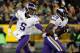 GREEN BAY, WI - JANUARY 03: Teddy Bridgewater #5 of the Minnesota Vikings hands the ball off to Adrian Peterson #28 during the first quarter against the Green Bay Packers at Lambeau Field on January 3, 2016 in Green Bay, Wisconsin. (Photo by Jon Durr/Getty Images)
