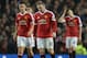 Manchester United's English striker Wayne Rooney (2nd R) and Manchester United's Spanish midfielder Ander Herrera (L) react after conceding a goal during the English Premier League football match between Manchester United and Swansea City at Old Trafford in Manchester, north west England, on January 2, 2016. Manchester United won the game 2-1. AFP PHOTO / OLI SCARFF
RESTRICTED TO EDITORIAL USE. No use with unauthorized audio, video, data, fixture lists, club/league logos or 'live' services. Online in-match use limited to 75 images, no video emulation. No use in betting, games or single club/league/player publications. / AFP / OLI SCARFF (Photo credit should read OLI SCARFF/AFP/Getty Images)