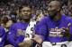 Los Angeles Lakers' Metta World Peace, left, and Los Angeles Lakers Kobe Bryant sit on the bench during the second half of an NBA basketball game against the Dallas Mavericks, Friday, Nov. 13, 2015, in Dallas. The Mavericks won 90-82. (AP Photo/LM Otero)