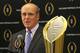 College Football Playoff executive director Bill Hancock announces that Atlanta will host the 2018 national championship game, Santa Clara, Calif., will host the 2019 game, and New Orleans will host the 2020 game, during a news conference Wednesday, Nov. 4, 2015, in Rosemont, Ill. (AP Photo/Charles Rex Arbogast)