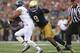 SOUTH BEND, IN - AUGUST 30: Jaylon Smith #9 of the Notre Dame Fighting Irish moves to tackle Darik Dillard #32 of the Rice Owls at Notre Dame Stadium on August 30, 2014 in South Bend, Indiana. Notre Dame defeated Rice 48-17. (Photo by Jonathan Daniel/Getty Images)