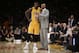 Los Angeles Lakers head coach Byron Scott, right, talks to Julius Randle during the first half of an NBA basketball game against the Minnesota Timberwolves, Wednesday, Oct. 28, 2015, in Los Angeles. (AP Photo/Jae C. Hong)