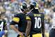 Pittsburgh Steelers quarterback Ben Roethlisberger (7) talks with Pittsburgh Steelers wide receiver Martavis Bryant (10) during an NFL football game against the Oakland Raiders, Sunday, Nov. 8, 2015, in Pittsburgh. (AP Photo/Gene J. Puskar)