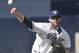 San Diego Padres starting pitcher Ian Kennedy works against the Milwaukee Brewers in the first inning of a baseball game Thursday, Oct. 1, 2015, in San Diego. (AP Photo/Lenny Ignelzi)