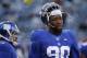 New York Giants defensive end Jason Pierre-Paul (90) warms up before playing against the Philadelphia Eagles in an NFL football game, Sunday, Jan. 3, 2016, in East Rutherford, N.J. (AP Photo/Julio Cortez)
