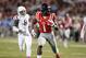 Mississippi wide receiver Laquon Treadwell (1) sprints away from Texas A&M defensive back Nick Harvey (8) for a 58 yard touchdown pass reception during the second half of their NCAA college football game in Oxford, Miss., Saturday, Oct. 24, 2015. No. 24 Mississippi won 23-3. (AP Photo/Rogelio V. Solis)