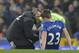 Everton's Irish defender Seamus Coleman (R) receives treatment before going off injured during the English League Cup semi-final first leg football match between Everton and Manchester City at Goodison Park in Liverpool, north west England on January 6, 2016. AFP PHOTO / PAUL ELLIS
RESTRICTED TO EDITORIAL USE. No use with unauthorized audio, video, data, fixture lists, club/league logos or 'live' services. Online in-match use limited to 75 images, no video emulation. No use in betting, games or single club/league/player publications. / AFP / PAUL ELLIS (Photo credit should read PAUL ELLIS/AFP/Getty Images)