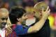 FC Barcelona's Lionel Messi from Argentina, left, celebrates his victory with coach Josep Guardiola during the final Copa del Rey soccer match against Athletic Bilbao at the Vicente Calderon stadium in Madrid, Spain, Friday, May 25, 2012. (AP Photo/Andres Kudacki)