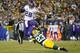GREEN BAY, WI - JANUARY 03: Adrian Peterson #28 of the Minnesota Vikings hurdles Damarious Randall #23 of the Green Bay Packers during the third quarter of their game at Lambeau Field on January 3, 2016 in Green Bay, Wisconsin. (Photo by Wesley Hitt/Getty Images)