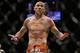 Donald Cerrone gestures after defeating John Makdessi in their lightweight mixed martial arts bout at UFC on 187 Saturday, May 23, 2015, in Las Vegas. (AP Photo/John Locher)
