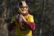 Washington Redskins quarterback Kirk Cousins, eyes the receiver during NFL football practice at Redskins Park in Ashburn, Va., Wednesday, Jan. 6, 2016. (AP Photo/Manuel Balce Ceneta)