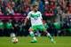 MUNICH, GERMANY - SEPTEMBER 22: Ricardo Rodriguez of Wolfsburg runs with the ball during the Bundesliga match between FC Bayern Muenchen and VfL Wolfsburg at Allianz Arena on September 22, 2015 in Munich, Germany. (Photo by Boris Streubel/Getty Images)