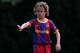 BARCELONA, SPAIN - MAY 15: Eight-year-old Barcelona youth player Xavi Simons instructs his teammates during his match againts Llongueras on one of the pitches at the Joan Camper training ground on May 15, 2011 in Barcelona, Spain. Every weekend various teams of Barcelona youth players play in matches with the hope of one day making it to the top. (Photo by Jasper Juinen/Getty Images)