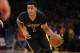 Los Angeles Lakers' D'Angelo Russell dribbles against the Philadelphia 76ers during the second half of an NBA basketball game, Friday, Jan. 1, 2016, in Los Angeles. The Lakers won 93-84. (AP Photo/Danny Moloshok)