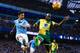 MANCHESTER, ENGLAND - OCTOBER 31: Jesus Navas of Manchester City FC competes for the ball with Youssouf Mulumbu of Norwich City during the Barclays Premier League match between Manchester City and Norwich City at Etihad Stadium on October 31, 2015 in Manchester, England. (Photo by David Ramos/Getty Images)