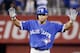 Toronto Blue Jays' Ben Revere celebrates a double against the Kansas City Royals during the first inning in Game 6 of baseball's American League Championship Series on Friday, Oct. 23, 2015, in Kansas City, Mo. (AP Photo/Charlie Riedel)
