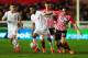 EXETER, ENGLAND - JANUARY 08: Jerome Sinclair of Liverpool holds off Jordan Tillson of Exeter City during the Emirates FA Cup third round match between Exeter City and Liverpool at St James Park on January 8, 2016 in Exeter, England. (Photo by Dan Mullan/Getty Images)