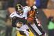Pittsburgh Steelers' Ben Roethlisberger (7) is sacked by Cincinnati Bengals' Vontaze Burfict (55) during the second half of an NFL wild-card playoff football game Saturday, Jan. 9, 2016, in Cincinnati. (AP Photo/Gary Landers)
