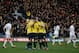 Oxford United players mob English midfielder Liam Sercombe as they celebrate his team's first goal from the penalty spot during the FA Cup third-round football match between Oxford United and Swansea City at the Kassam Stadium in Oxford, west of London, on January 10, 2016. AFP PHOTO / ADRIAN DENNIS
RESTRICTED TO EDITORIAL USE. No use with unauthorized audio, video, data, fixture lists, club/league logos or 'live' services. Online in-match use limited to 75 images, no video emulation. No use in betting, games or single club/league/player publications. / AFP / ADRIAN DENNIS (Photo credit should read ADRIAN DENNIS/AFP/Getty Images)
