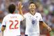 Jul 29, 2015; Denver, CO, USA; MLS All Stars midfielder Kaka (22) of Orlando City SC and defender Omar Gonzalez (4) of the LA Galaxy high-five during the first half of the 2015 MLS All Star Game against the Tottenham Hotspur at Dick's Sporting Goods Park. Mandatory Credit: Isaiah J. Downing-USA TODAY Sports