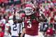 FAYETTEVILLE, AR - OCTOBER 31: Alex Collins #3 of the Arkansas Razorbacks celebrates with teammates after scoring a touchdown against the UT Martin Skyhawks at Razorback Stadium on October 31, 2015 in Fayetteville, Arkansas. The Razorbacks defeated the Skyhawks 63-28. (Photo by Wesley Hitt/Getty Images)
