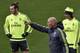 Real Madrid's new French coach Zinedine Zidane (C) points his finger next to Real Madrid's Welsh forward Gareth Bale (L) and Real Madrid's Croatian midfielder Luka Modric (R) during a training session at the Valdebebas training ground in Madrid on January 8, 2016. AFP PHOTO / GERARD JULIEN / AFP / GERARD JULIEN (Photo credit should read GERARD JULIEN/AFP/Getty Images)