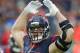 HOUSTON, TX - JANUARY 09: J.J. Watt #99 of the Houston Texans attempts to hype up the crowd during the AFC Wild Card game at NRG Stadium on January 9, 2016 in Houston, Texas. (Photo by Bob Levey/Getty Images)