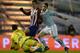 Celta Vigo's goalkeeper Sergio Alvarez (L) catches the ball next to Atletico Madrid's Argentinian forward Luciano Vietto (C) and teammate defender Hugo Mallo during the Spanish league football match RC Celta de Vigo vs Club Atletico de Madrid at the Balaidos stadium in Vigo on January 10, 2016. AFP PHOTO/ MIGUEL RIOPA / AFP / MIGUEL RIOPA (Photo credit should read MIGUEL RIOPA/AFP/Getty Images)