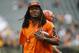 Cincinnati Bengals cornerback Adam Jones walks the field during practice before an NFL football game against the Pittsburgh Steelers, Sunday, Dec. 13, 2015, in Cincinnati. (AP Photo/Frank Victores)
