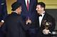 FC Barcelona and Argentina's forward Lionel Messi (R) holds his trophy as he shakes hands with FC Barcelona and Brazils forward Neymar after receiving the 2015 FIFA Ballon dOr award for player of the year during the 2015 FIFA Ballon d'Or award ceremony at the Kongresshaus in Zurich on January 11, 2016. AFP PHOTO / FABRICE COFFRINI / AFP / FABRICE COFFRINI (Photo credit should read FABRICE COFFRINI/AFP/Getty Images)