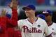 Philadelphia Phillies' Jeff Francoeur high fives teammates after they defeated the Miami Marlins 7-2 in a baseball game Sunday, Oct. 4, 2015, in Philadelphia. (AP Photo/Rich Schultz)