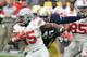 GLENDALE, AZ - JANUARY 01: Ezekiel Elliott #15 of the Ohio State Buckeyes runs with the ball as Romeo Okwara #45 of the Notre Dame Fighting Irish attempts to make a tackle during the BattleFrog Fiesta Bowl at the University of Phoenix Stadium on January 1, 2016 in Glendale, Arizona. Buckeyes won 44-28. (Photo by Norm Hall/Getty Images)