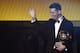 FC Barcelona and Argentina's forward Lionel Messi waves holding his trophy after receiving the 2015 FIFA Ballon dOr award for player of the year during the 2015 FIFA Ballon d'Or award ceremony at the Kongresshaus in Zurich on January 11, 2016. AFP PHOTO / OLIVIER MORIN / AFP / OLIVIER MORIN (Photo credit should read OLIVIER MORIN/AFP/Getty Images)