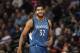 Minnesota Timberwolves center Karl-Anthony Towns (32) in the first half of an NBA basketball game Friday, Dec.11, 2015, in Denver. (AP Photo/David Zalubowski)